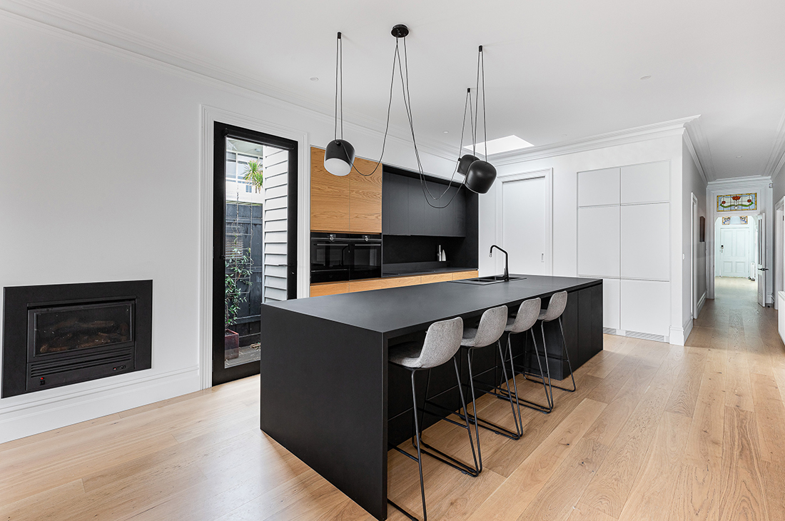 contemporary kitchen with black nanoparticle surface and oak veneer